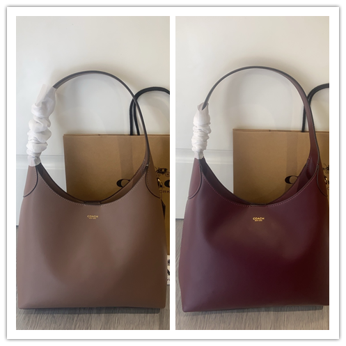 コーチ Brooklyn ショルダーバッグ｜エレガントなシンプルデザイン×ニューヨーク態度｜半月型・天然粒面レザー｜マグネット留め具｜28×43cm｜多機能ポケット付き・充足収納力