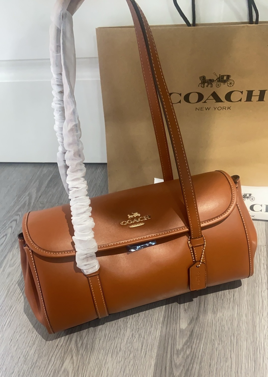 コーチ 新作 Birdget ハンドバッグ｜暖調キャラメルマキアート｜低調高級感・一目で心奪われ