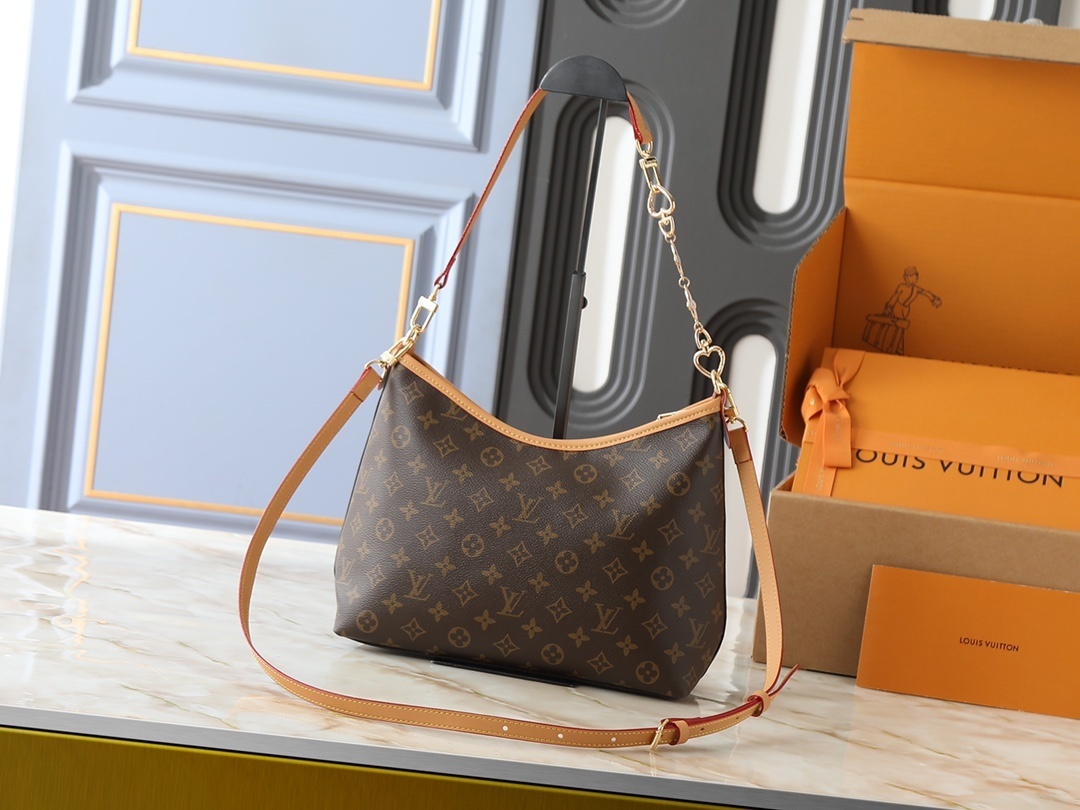 Louis Vuitton CarryAll バッグ】モノグラム帆布とレザートリミングの融合:都市生活に最適な機能性とスタイリッシュなデザイン